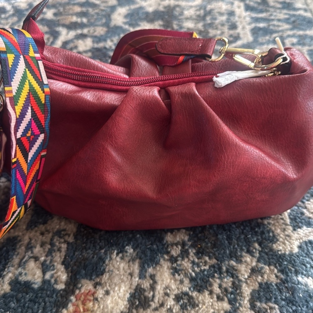 Stylish Burgundy Leather slouchy Bag with Colorful guitar Strap
